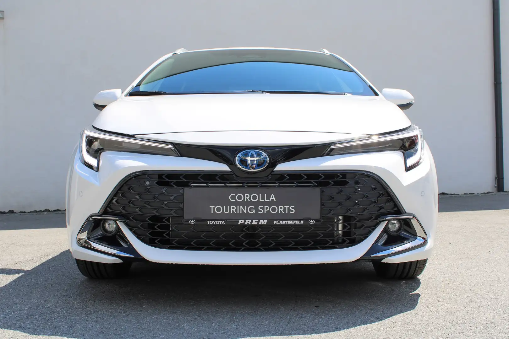Toyota Corolla TS 1.8 Hybrid Active Drive mit Safety Paket! Weiß - 1