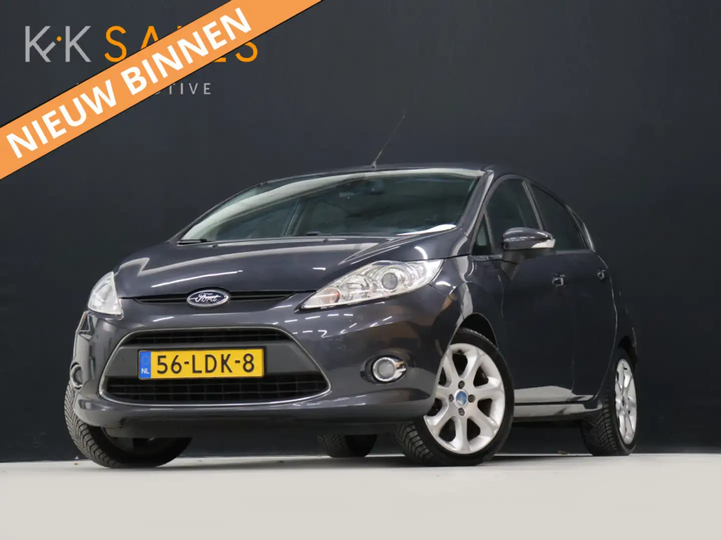 Ford Fiesta 1.25 Titanium [TREKHAAK, CRUISE CONTROL, BLUETOOTH Grijs - 1