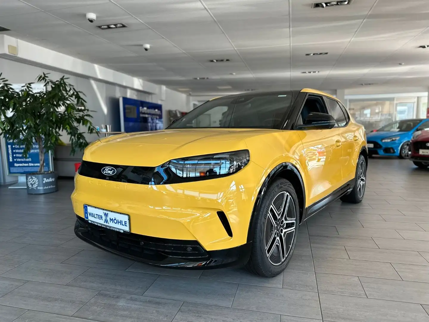 Ford Capri Premium *Pano/ Wärmepumpe/ 360° Kamera" Jaune - 1