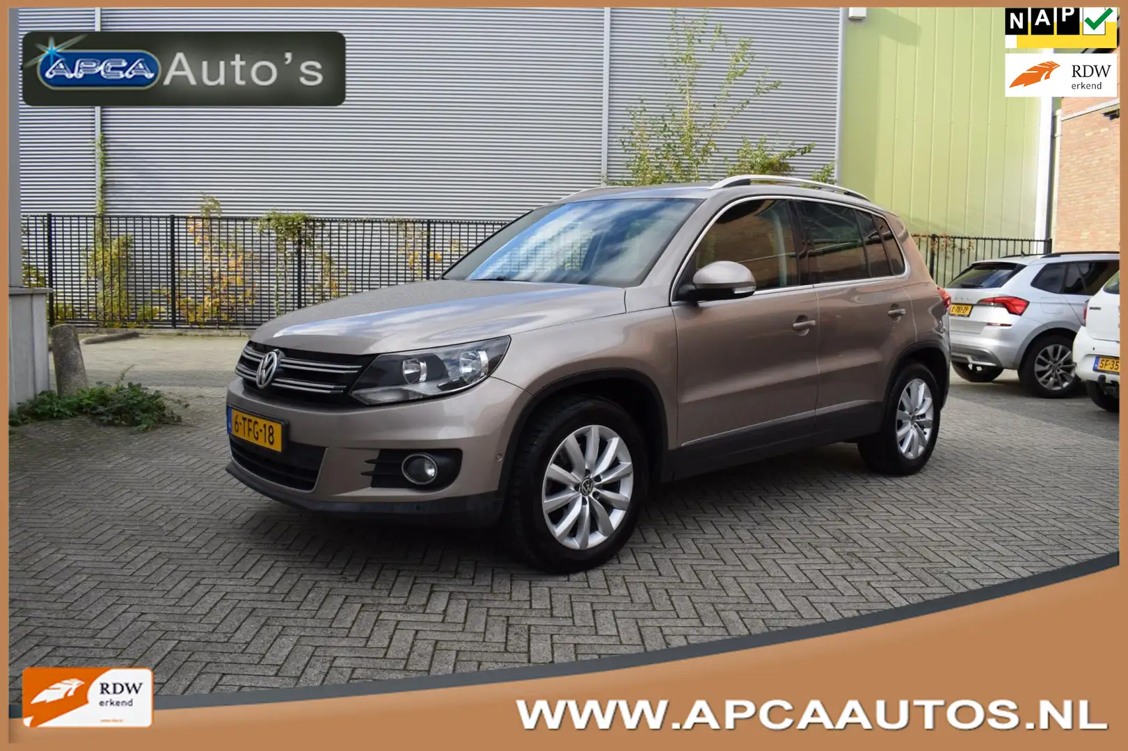 Volkswagen Tiguan 1.4 TSI Sport&Style 12 mnd GARANTIE Park Asist ( z Beige - 1