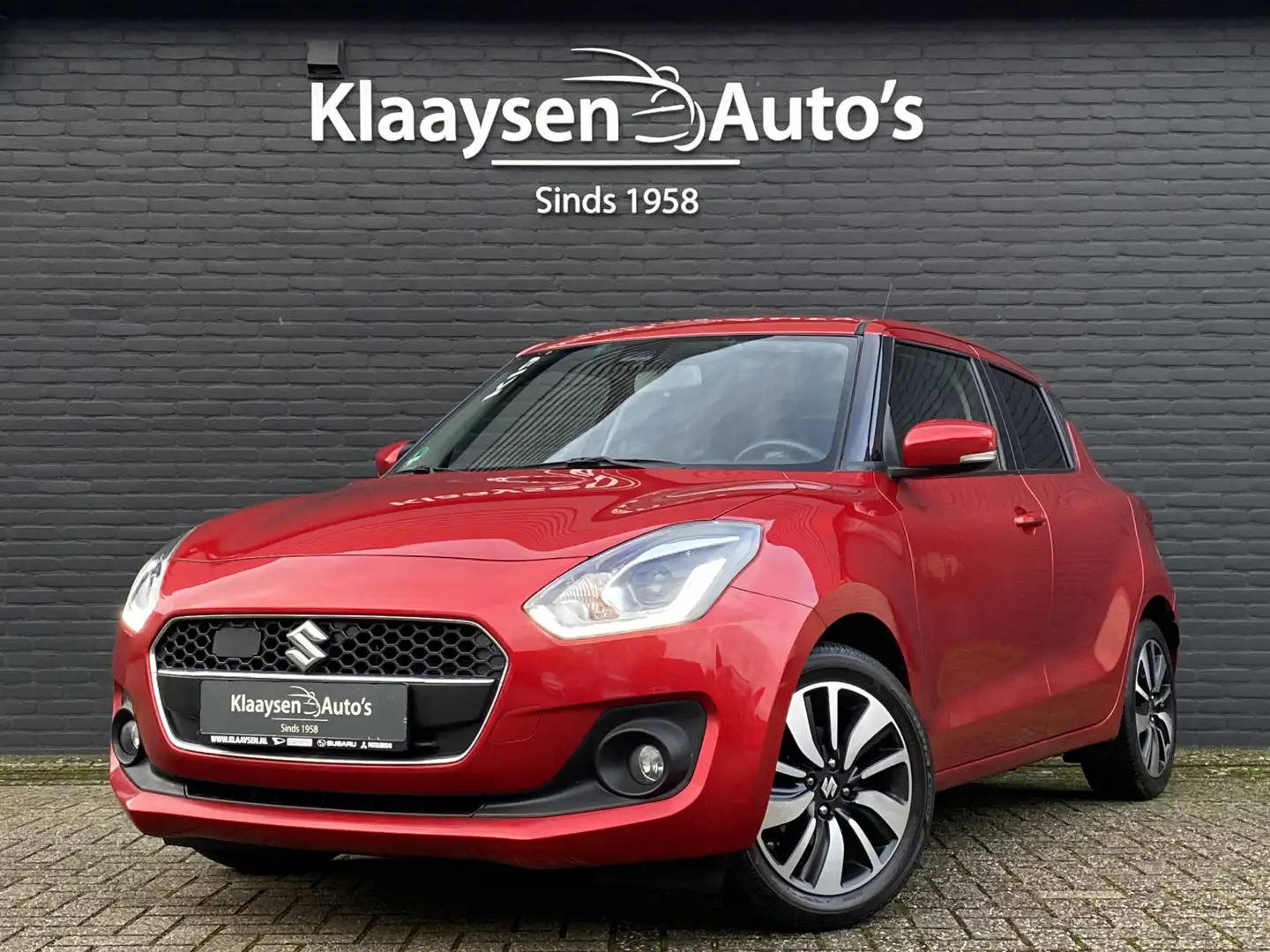 Suzuki Swift 1.0 Stijl 112 pk Smart Hybrid | 1e eigenaar | deal Rojo - 1