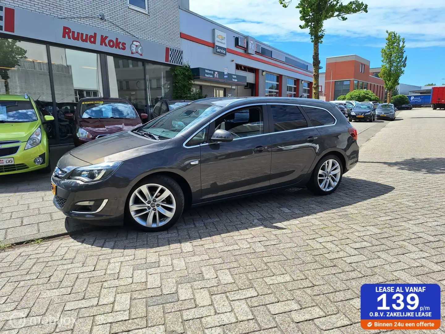 Opel Astra SPORTS TOURER 1.4 Turbo Business + Grijs - 1