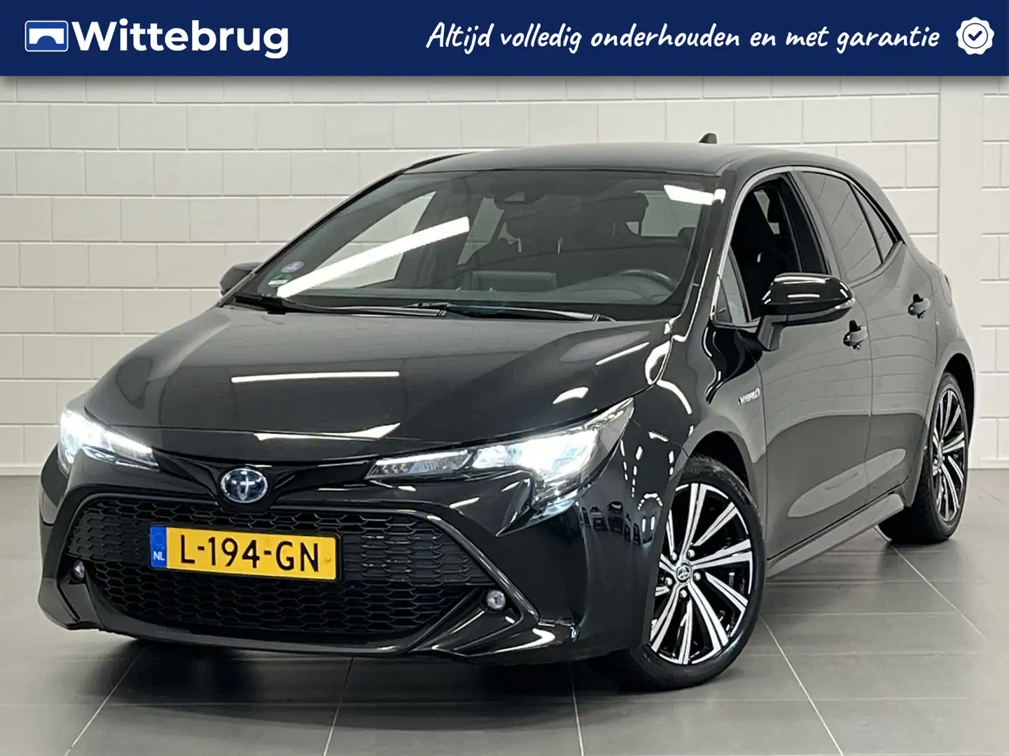 Toyota Corolla 1.8 Hybrid Dynamic TREKHAAK | APPLE / ANDROID NAVI Zwart - 1
