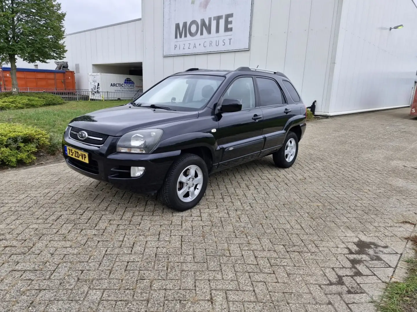 Kia Sportage 2.0 CVVT X-ecutive Zwart - 1