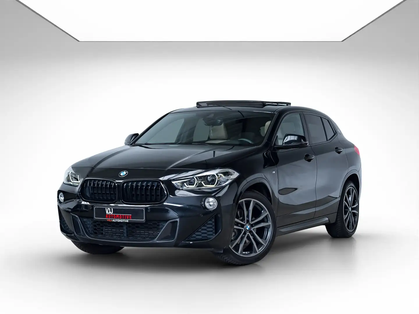 BMW X2 X2 sDrive18i Aut | GARANTIE | M PAKKET | PANO | Noir - 1