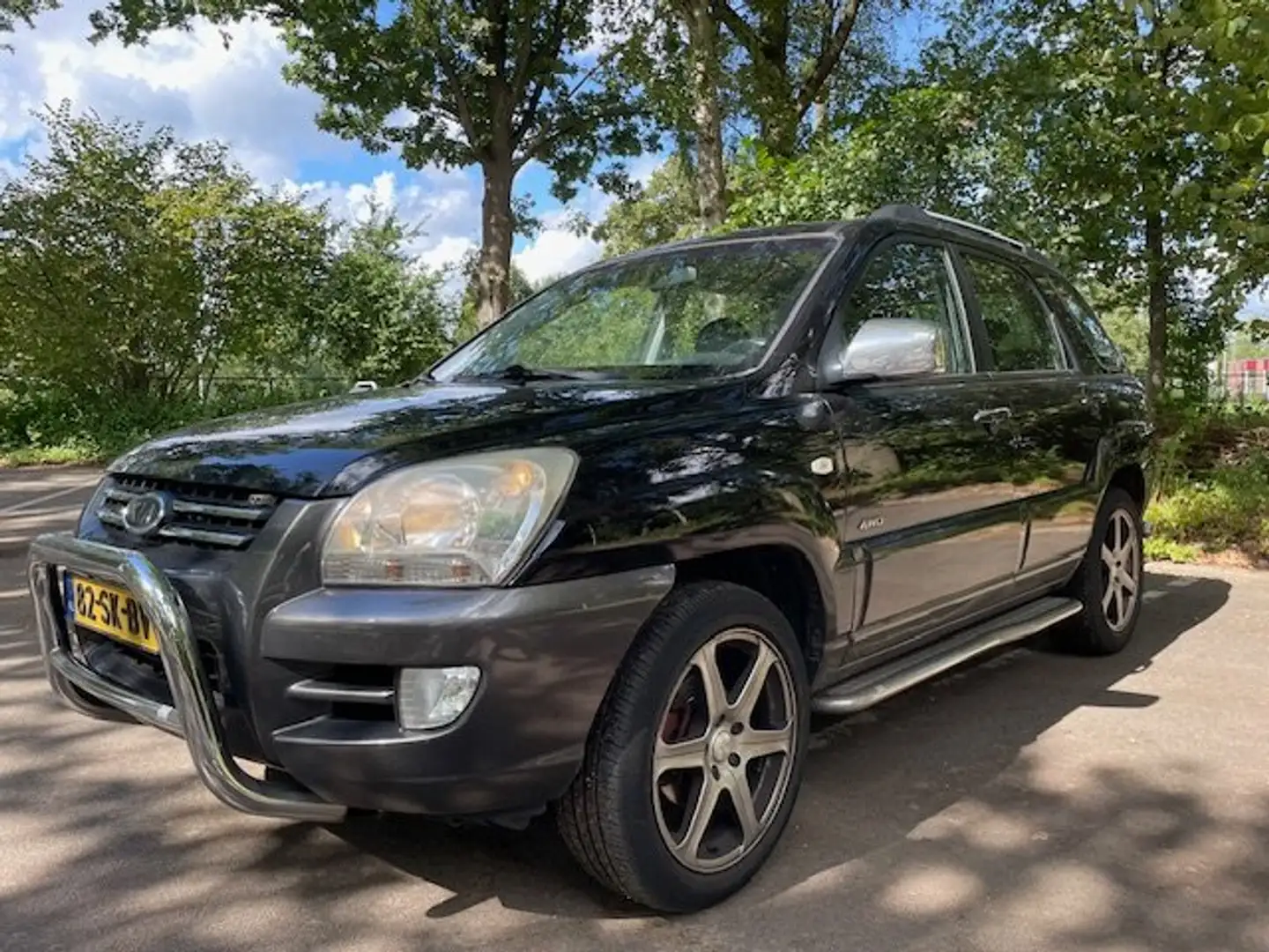 Kia Sportage 2.7 LPG Schwarz - 1