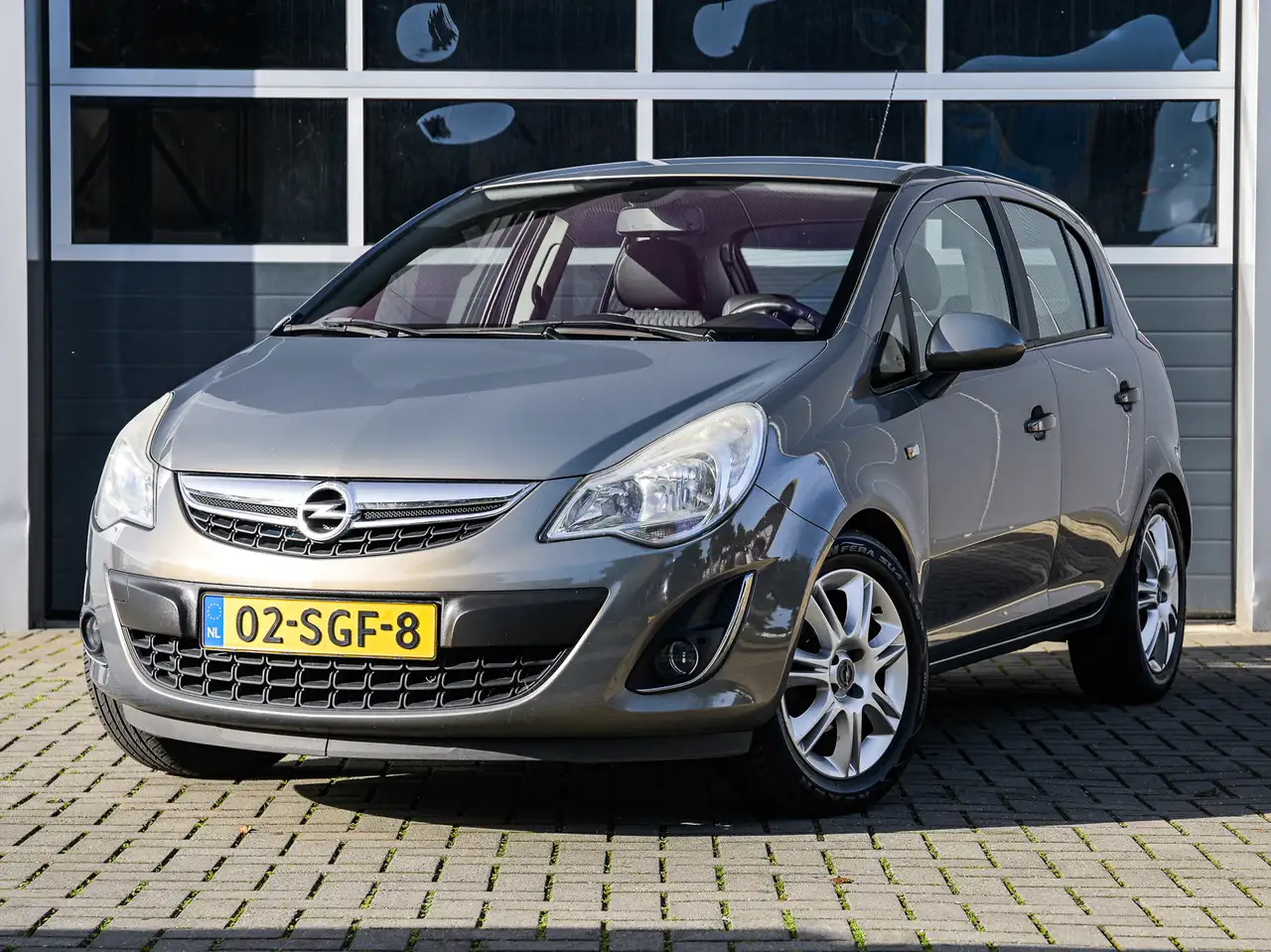 Opel Corsa 1.2-16V Cosmo | Automaat | Climate control | Cruis — photo 1 of 26