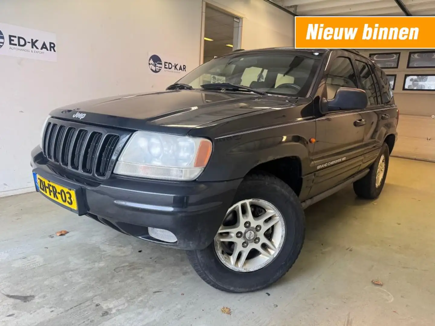 Jeep Grand Cherokee 4.7i V8 Ltd AUT 4WD LEER 2dev EIG. NAP N APK RIJDT Grijs - 1