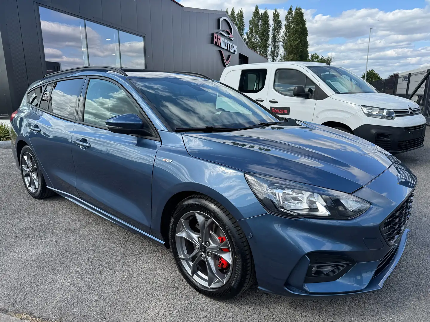 Ford Focus Focus Turnier 1.0 EcoBoost Hybrid ST-LINE 1st eig Blauw - 1