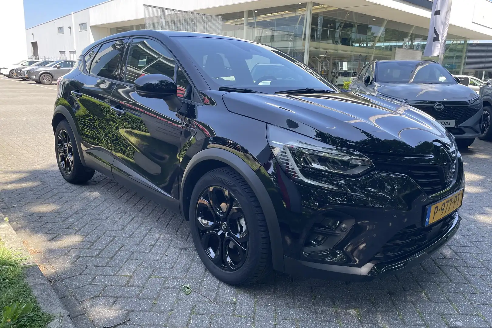 Renault Captur 1.6 E-Tech Hybrid 145 Rive Gauche Automaat | 1e ei Zwart - 2