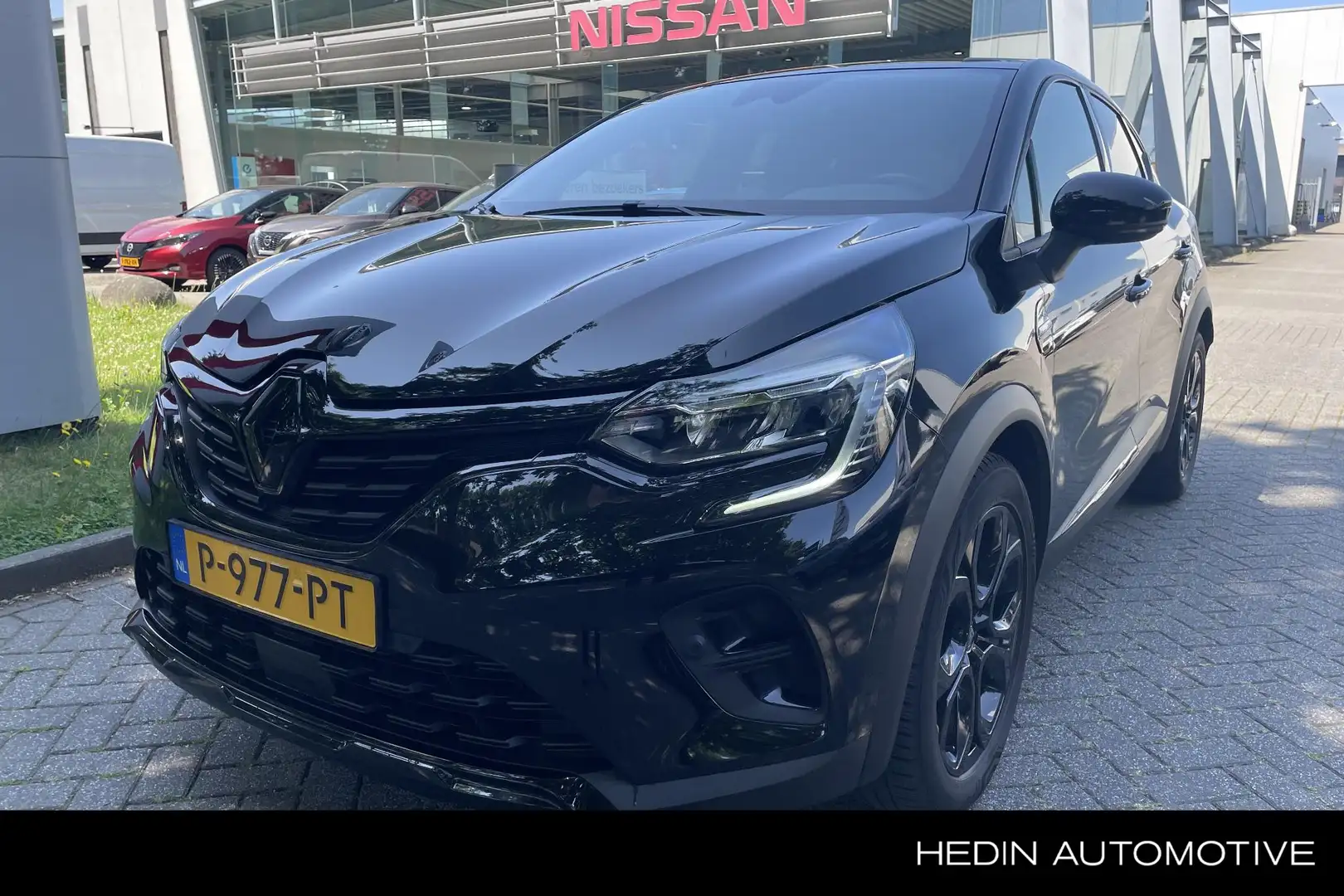 Renault Captur 1.6 E-Tech Hybrid 145 Rive Gauche Automaat | 1e ei Zwart - 1