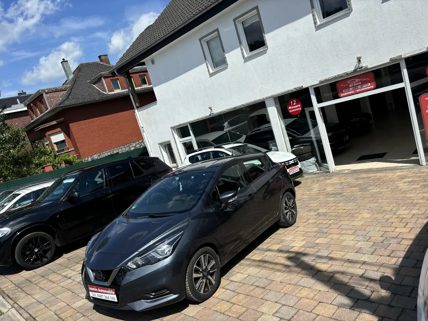 Nissan Micra 1.0i*BOSE*5PORTES*GPS*CAMERA*AIRCO*GARANTIE 12MOIS Gris - 1