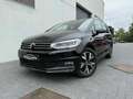 Volkswagen Touran HIGHLINE BUSINESS 1.5TSI 150PK PANO DAK 7ZIT DSG Zwart - thumbnail 1