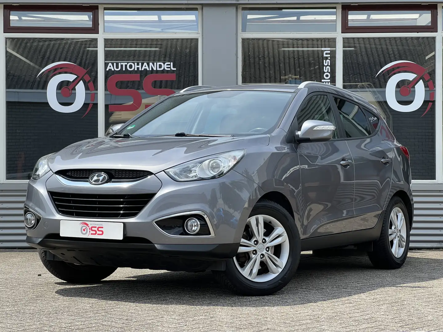 Hyundai iX35 1.6i GDI Business Edition 1E EIGENAAR AIRCO CAMERA Grijs - 1