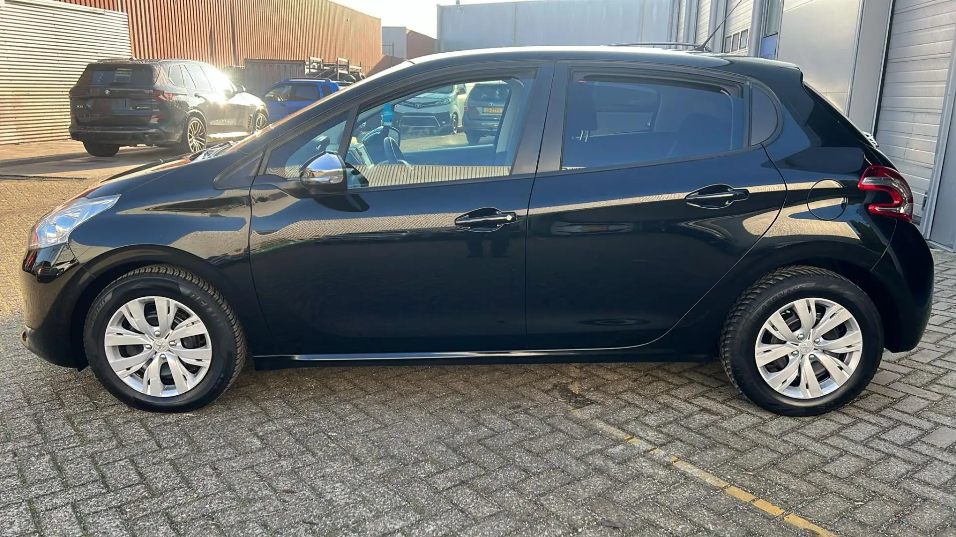 Peugeot 208 1.2 VTi Oxygo Airco,navi,2 eig, NAP Noir - 1