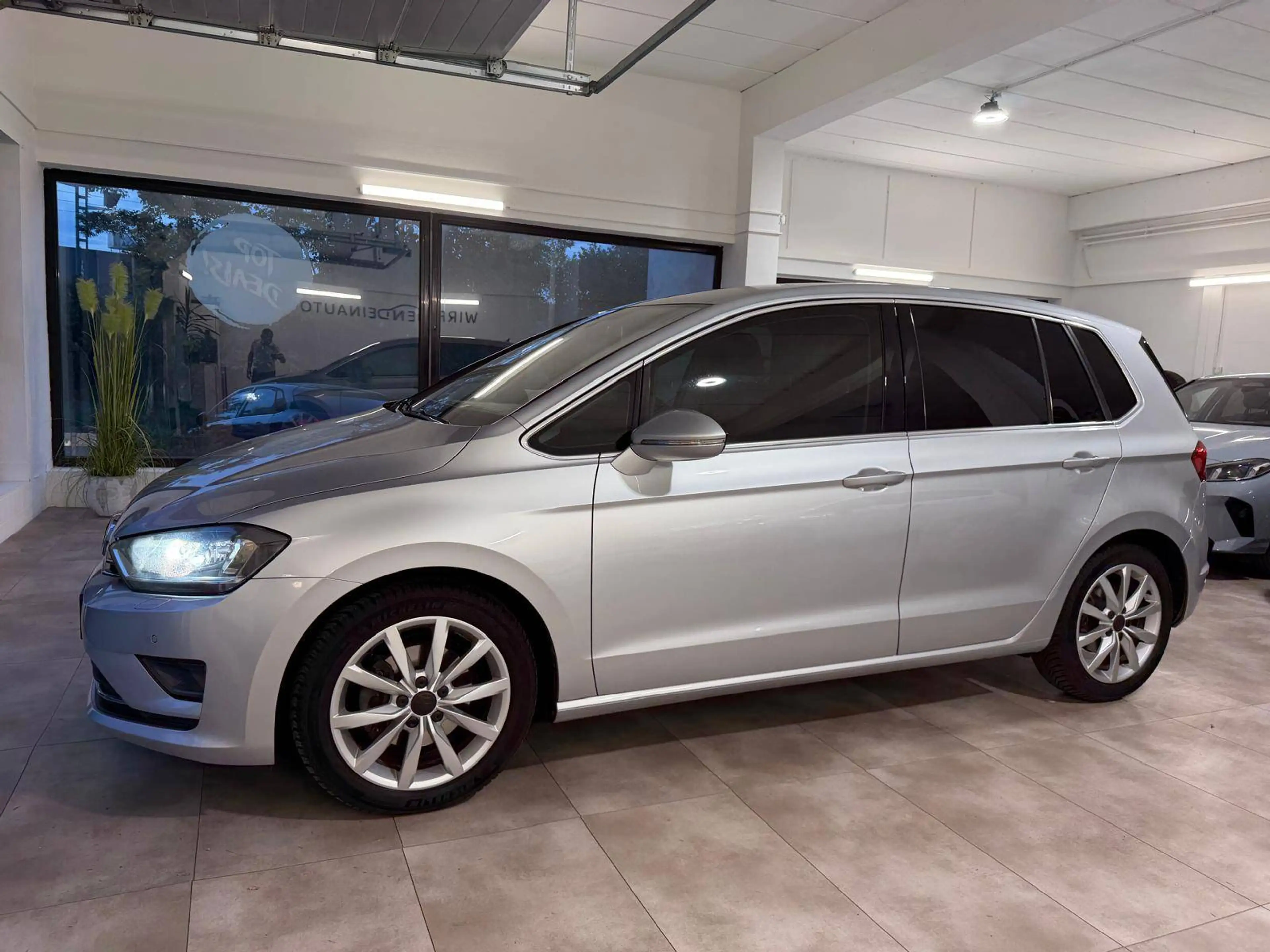 Volkswagen Golf Sportsvan Highline BlueMotion — photo 10