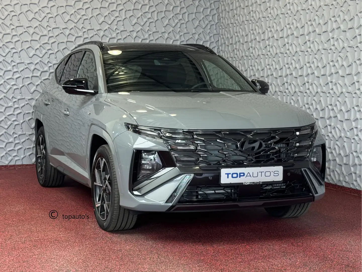 Hyundai TUCSON NIEUWE AUTO 1.6 T-GDI PHEV 252PK 4WD N-LINE SKY PA Grigio - 1