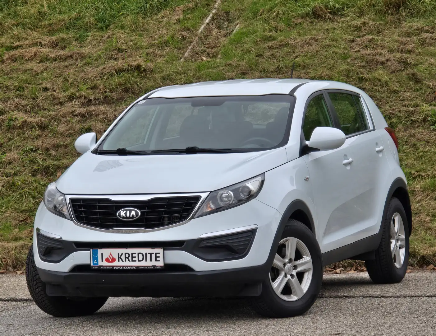 Kia Sportage 1,7 CRDI Top* Kredit* Tempomat* Sitzheizung* PDC* Weiß - 1