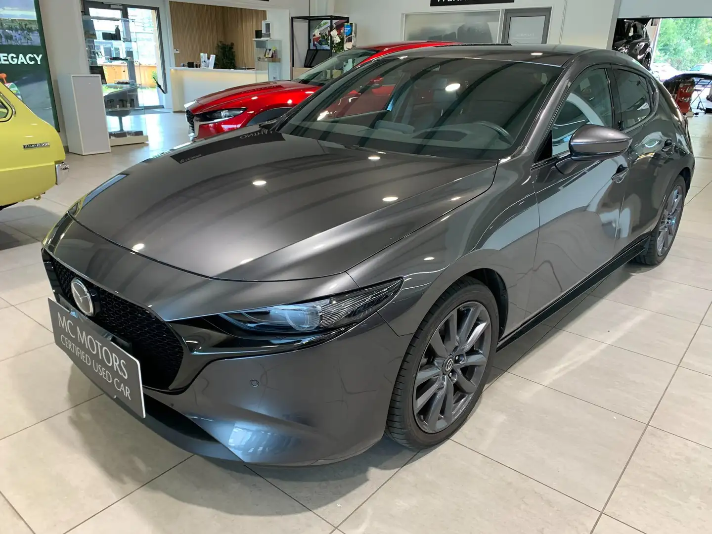 Mazda 3 Hatchback 2.0i e-Skyactiv-G Exclusive-line Bose 5 Grau - 1