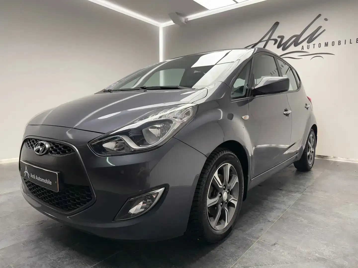 Hyundai iX20 1.6i*CAMERA*GPS*SIEGES + VOL CHAUFF*GARANTIE* Gris - 1