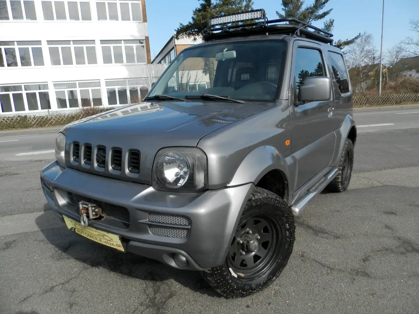Suzuki Jimny Comfort Lim.4x4*AHK*Klima*Navi*LED Grau - 1