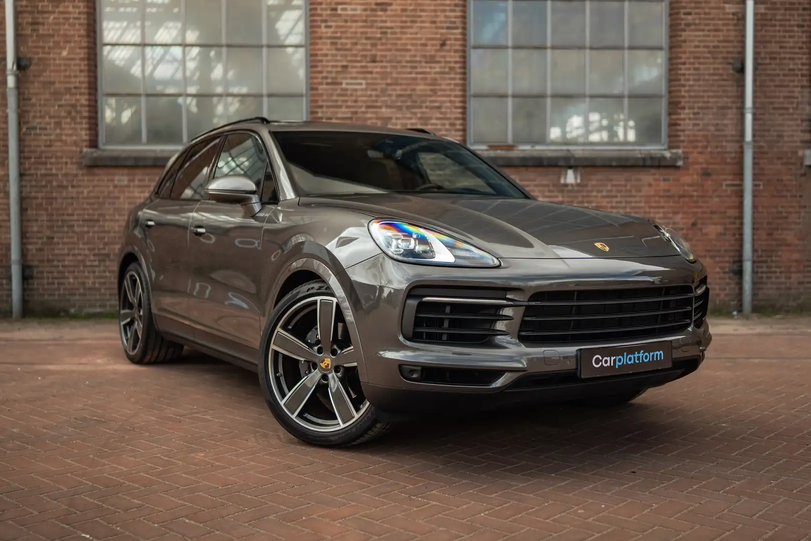 Porsche Cayenne 3.0 E-Hybrid | Pano | Bose | Head up | 22 Inch | 1 Grijs - 1