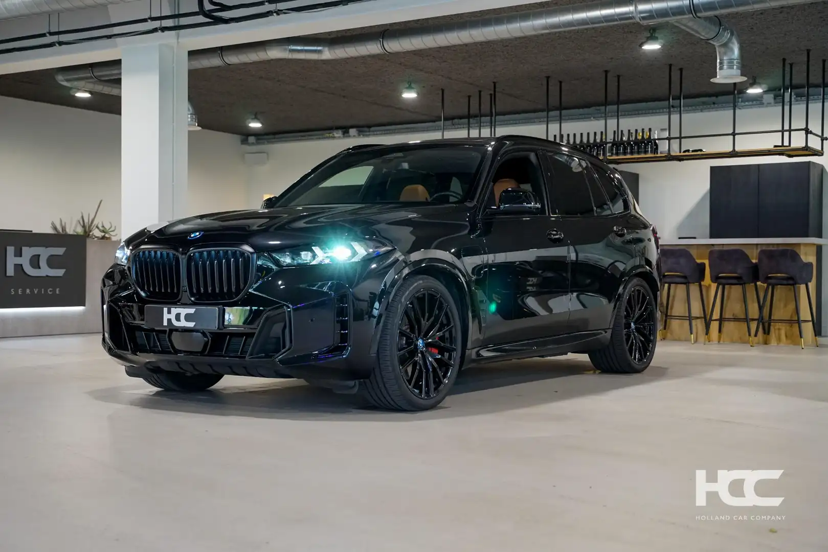 BMW X5 xDrive50e M Sport Pro | 22'' | Pano | Trekhaak | Schwarz - 1