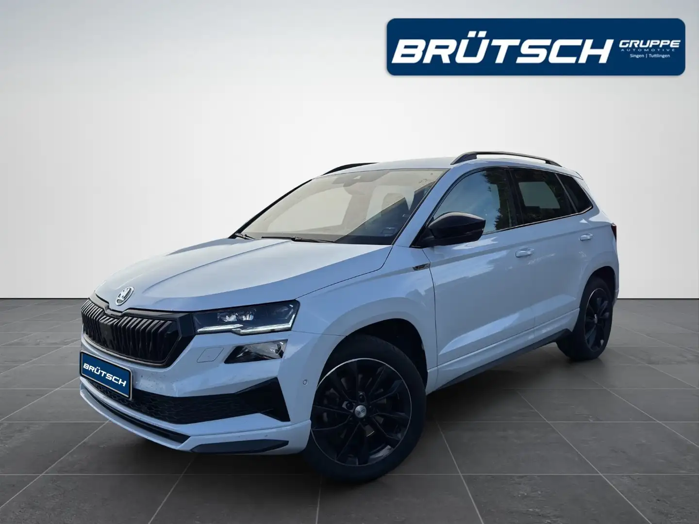 Skoda Karoq 1.5 TSI Sportline DSG / AHK / LEDER / KAMERA360 / Weiß - 1