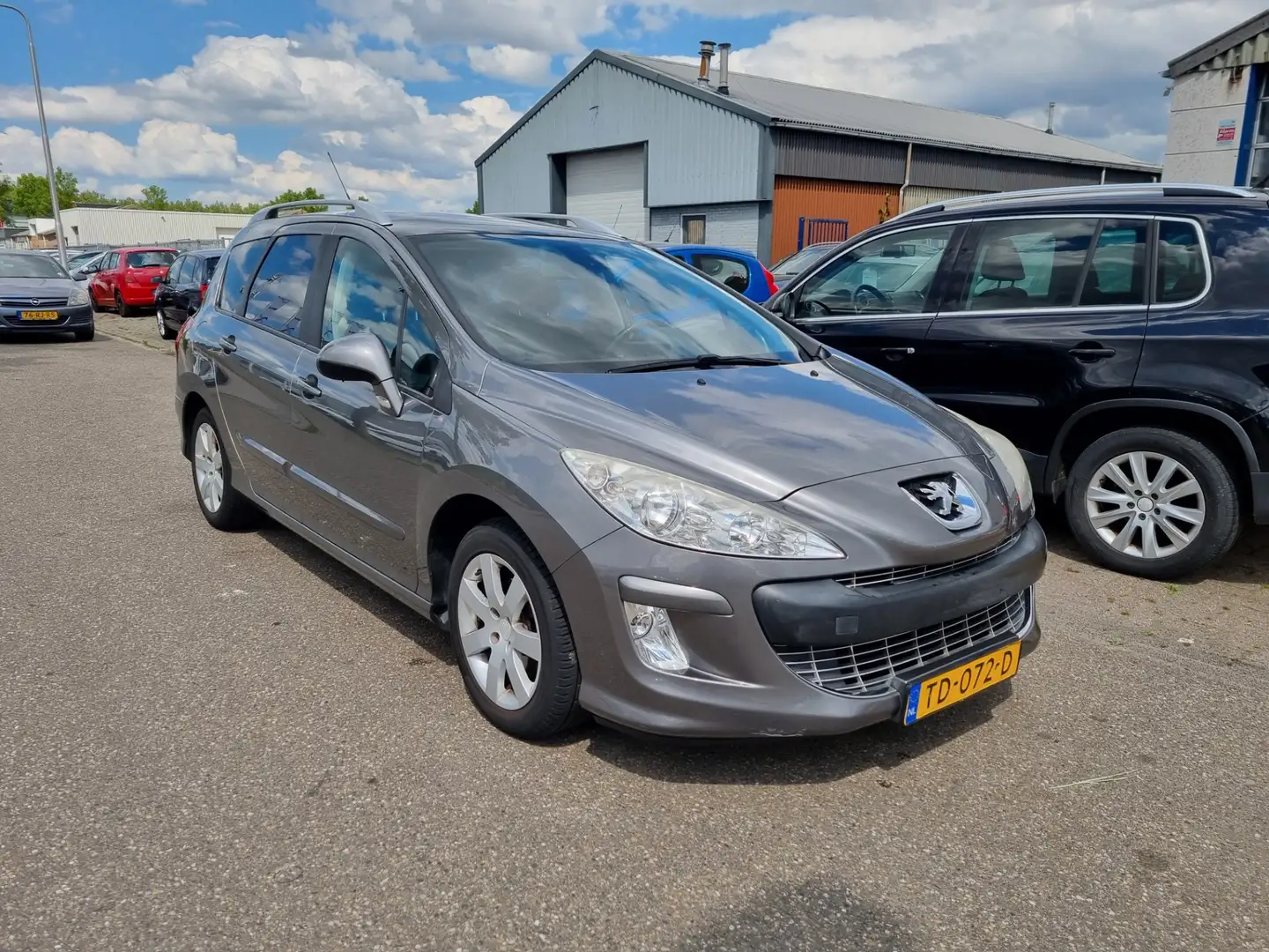 Peugeot 308 SW 1.6 VTi XS Première NAV.+ Airco Bj:2009 Grijs - 2