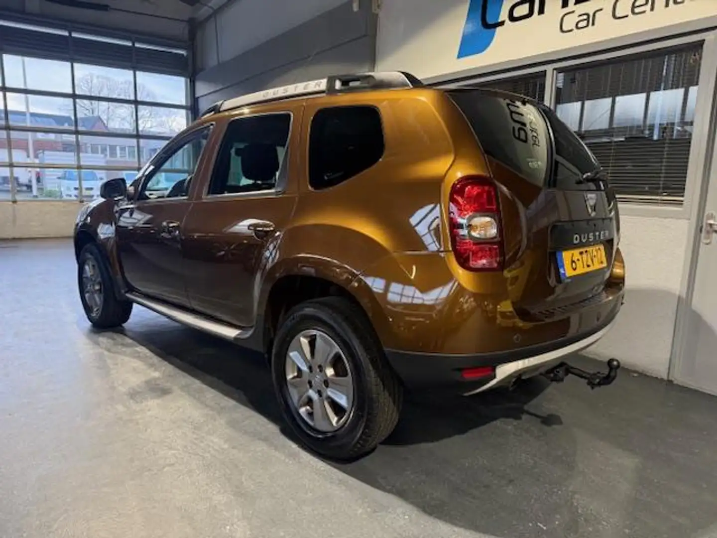 Dacia Duster 1.2 TCe 4x2 Prestige Navi|Cruise|Trekhaak|PDC Braun - 2