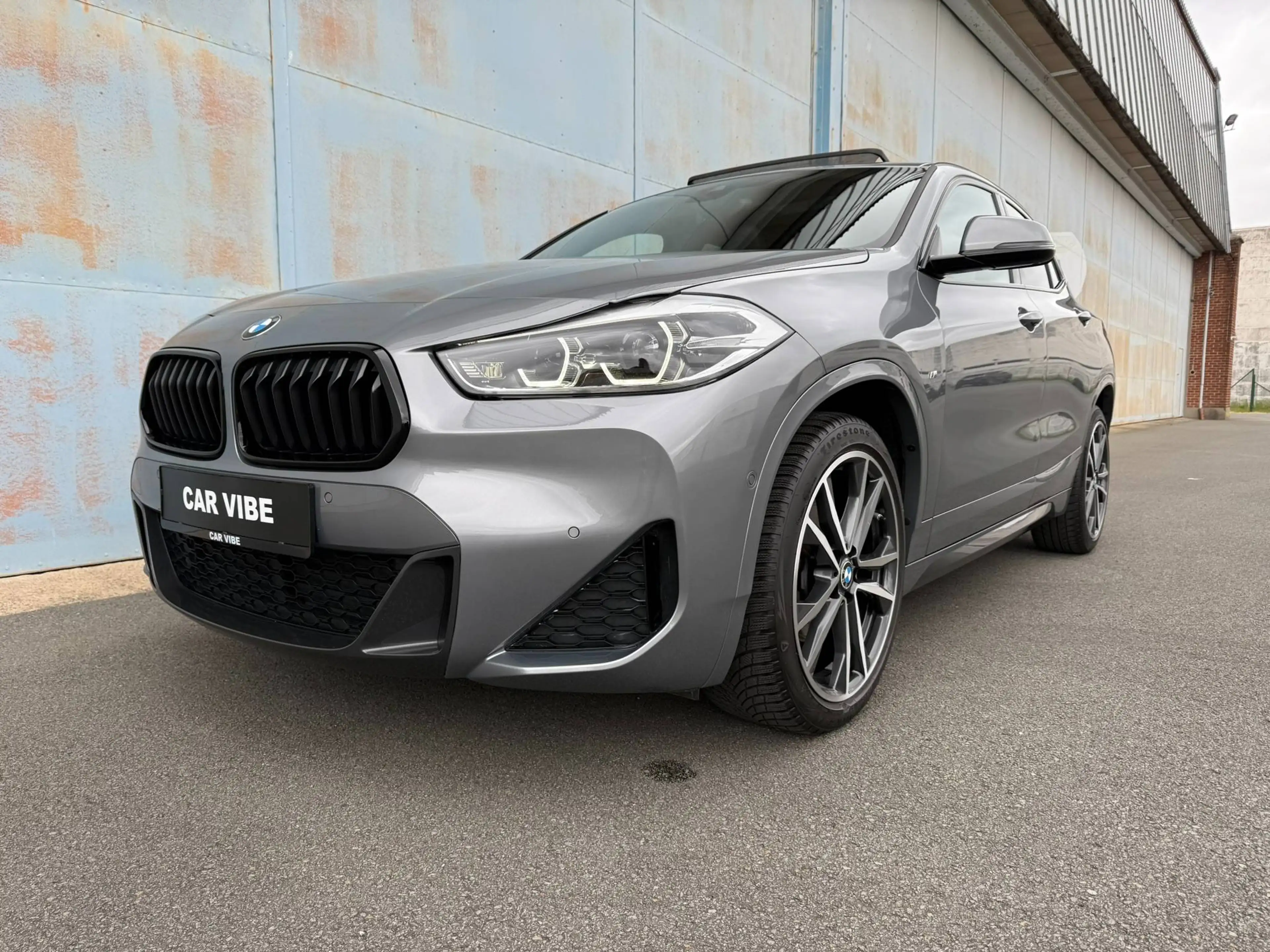 BMW X2 X2 sDrive18i - M sportpakket - Panoramisch open dak - Camera - GPS - Leder - Belgische wagen - Eerste eigenaar