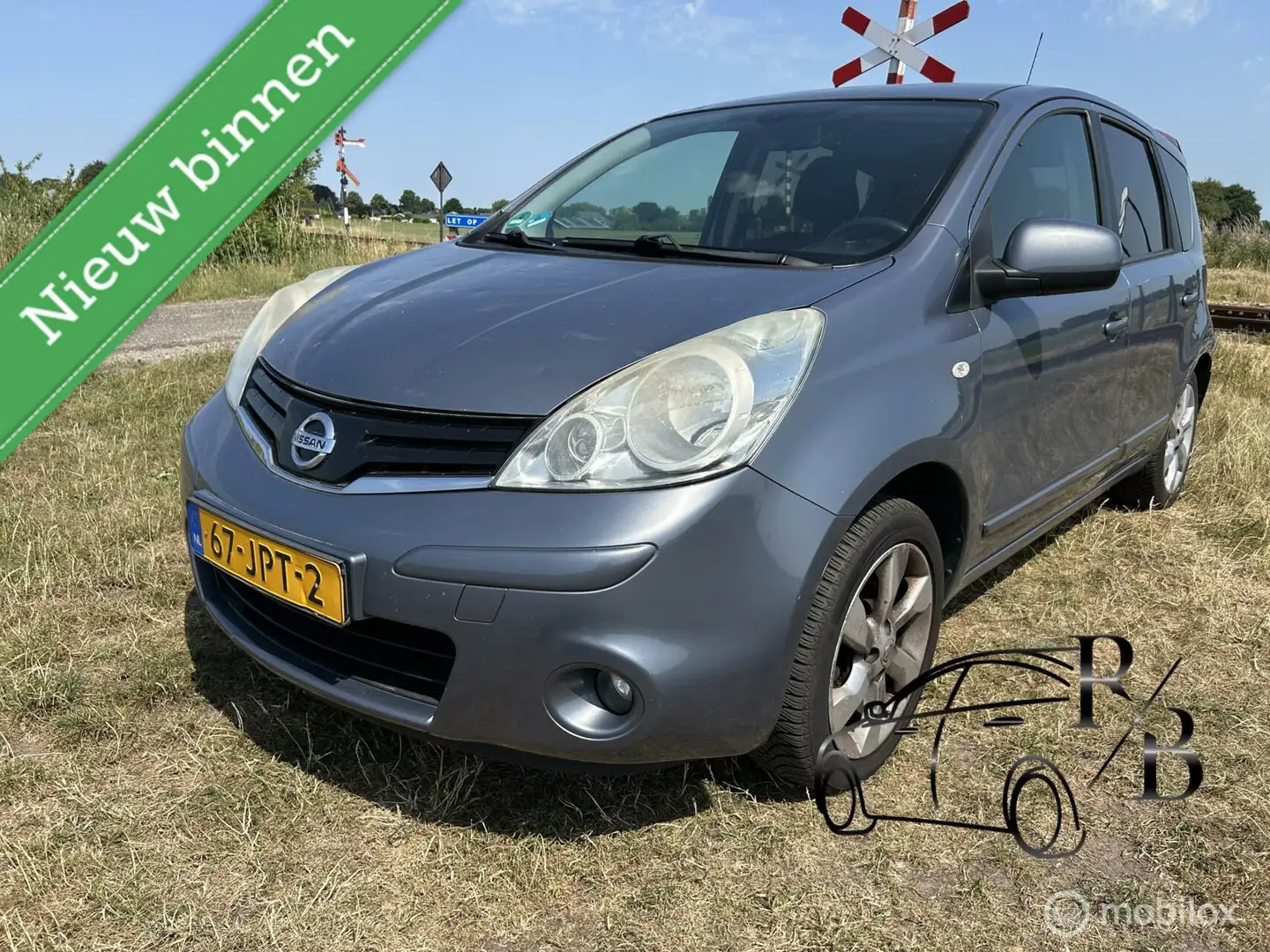Nissan Note 1.6 Acenta AIRCO CRUISE NAVI VASTE HANDELSPRIJS Blauw - 1