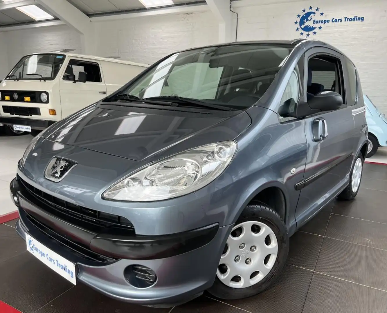Peugeot 1007 TRENDY 1.4i 74 CH 1ÈRE MAIN CLIM GAR 12M Grijs - 1