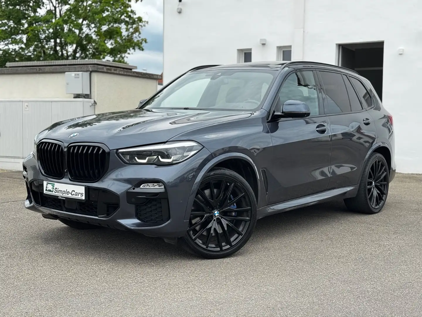 BMW X5 M d *AHK*PANO*HUD*HARMAN*22 ZOLL*AKTIV-LENK Grijs - 1
