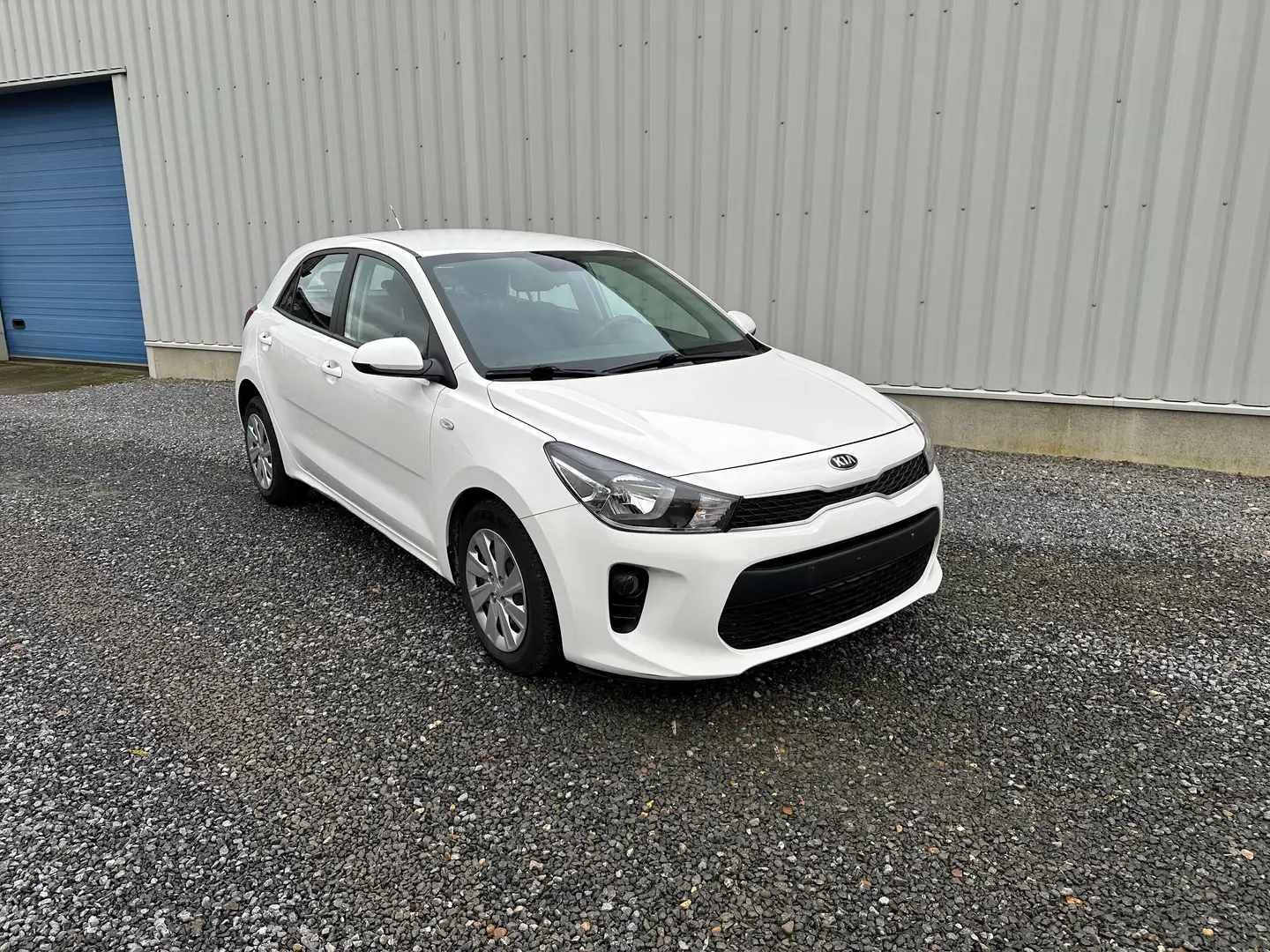 Kia Rio 1.2i benzine met garantie en Car-Pass Wit - 1