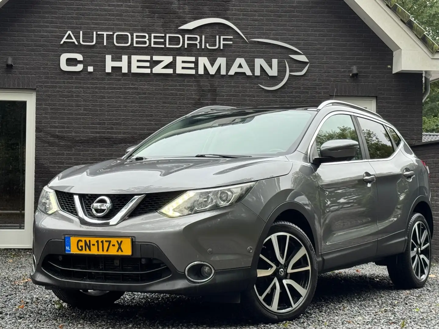 Nissan Qashqai 1.2 Tekna Bomvol PANO NAVI LEER XENON LED CRUISE C Gris - 1