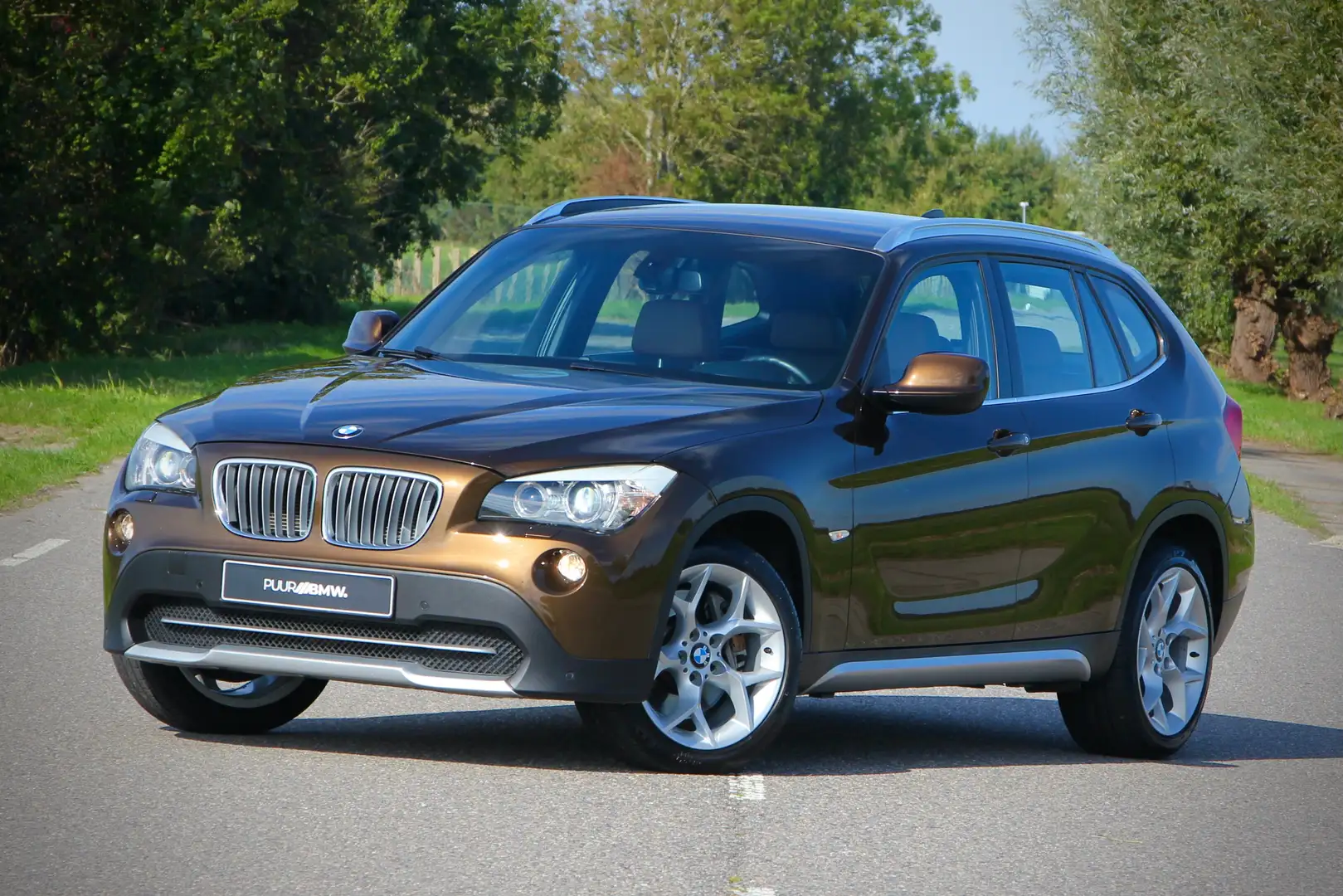 BMW X1 28i xDrive High Executive 3.0i zes-in-lijn 258pk Brun - 1