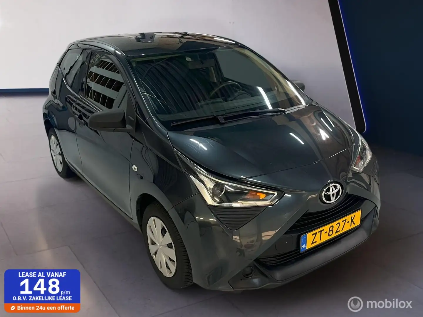 Toyota Aygo 1.0 VVT-i x-fun ✓Airco✓4seizoen.✓Bluetoot✓Org.NL Gris - 1