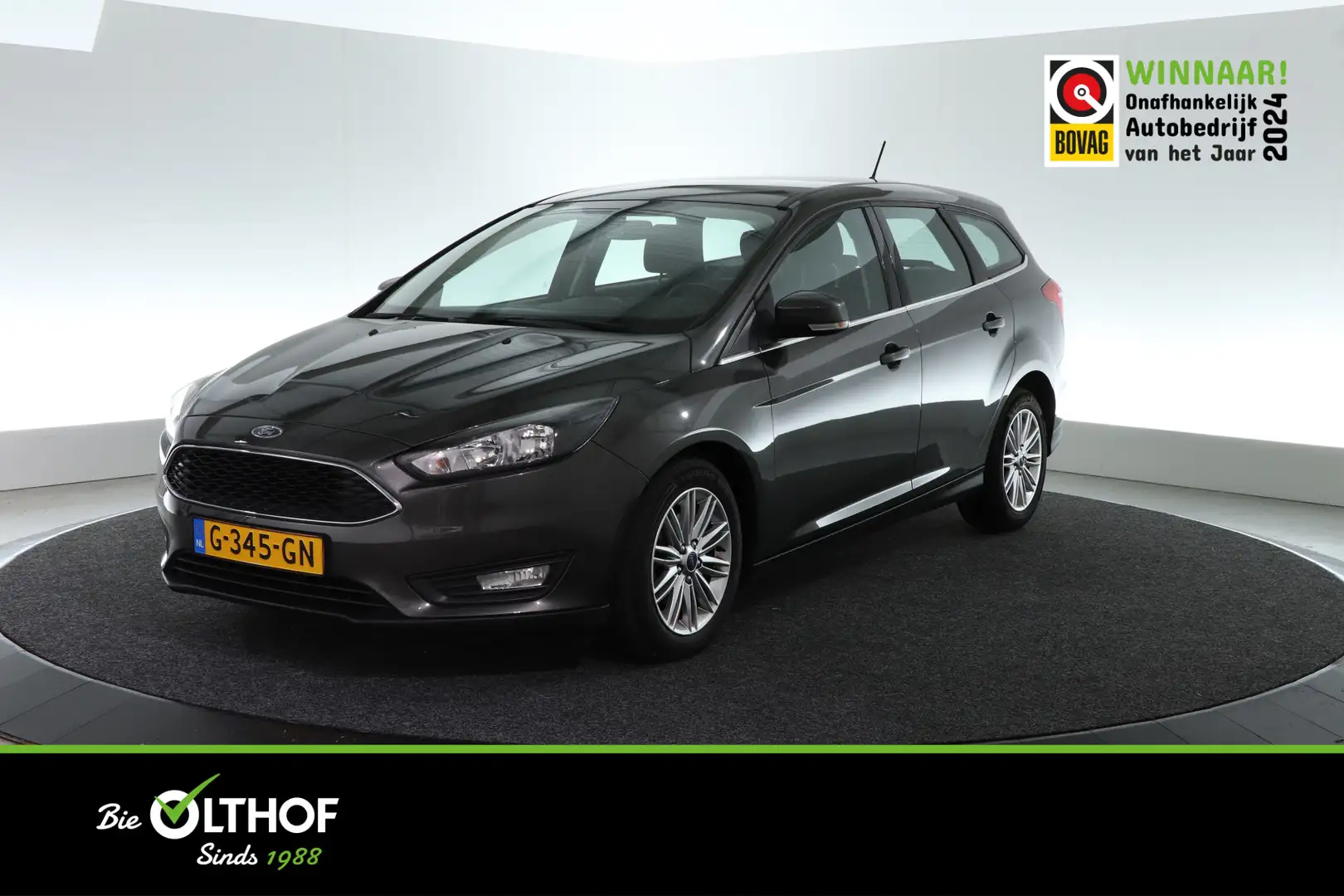 Ford Focus Wagon 1.0 Titanium | CLIMA | CRUISE | CARPLAY | PD Grijs - 1