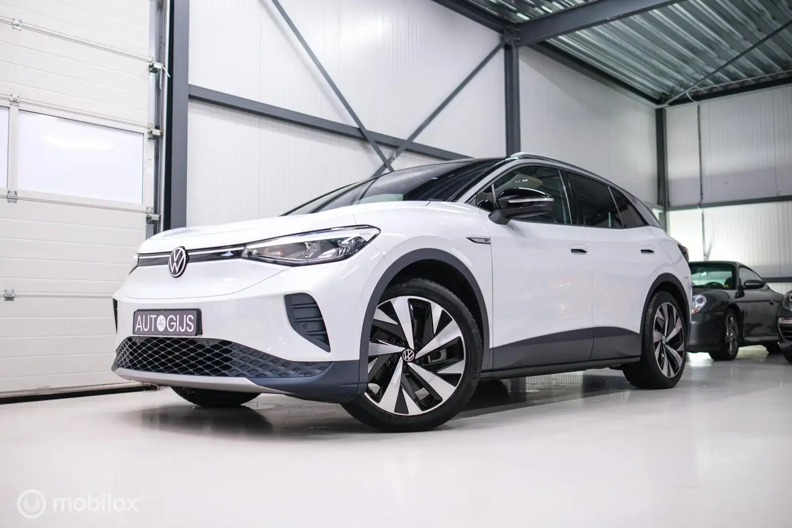 Volkswagen ID.4 First 77 kWh | Nieuwe ACCU | Trekhaak | Camera | 2 Wit - 1