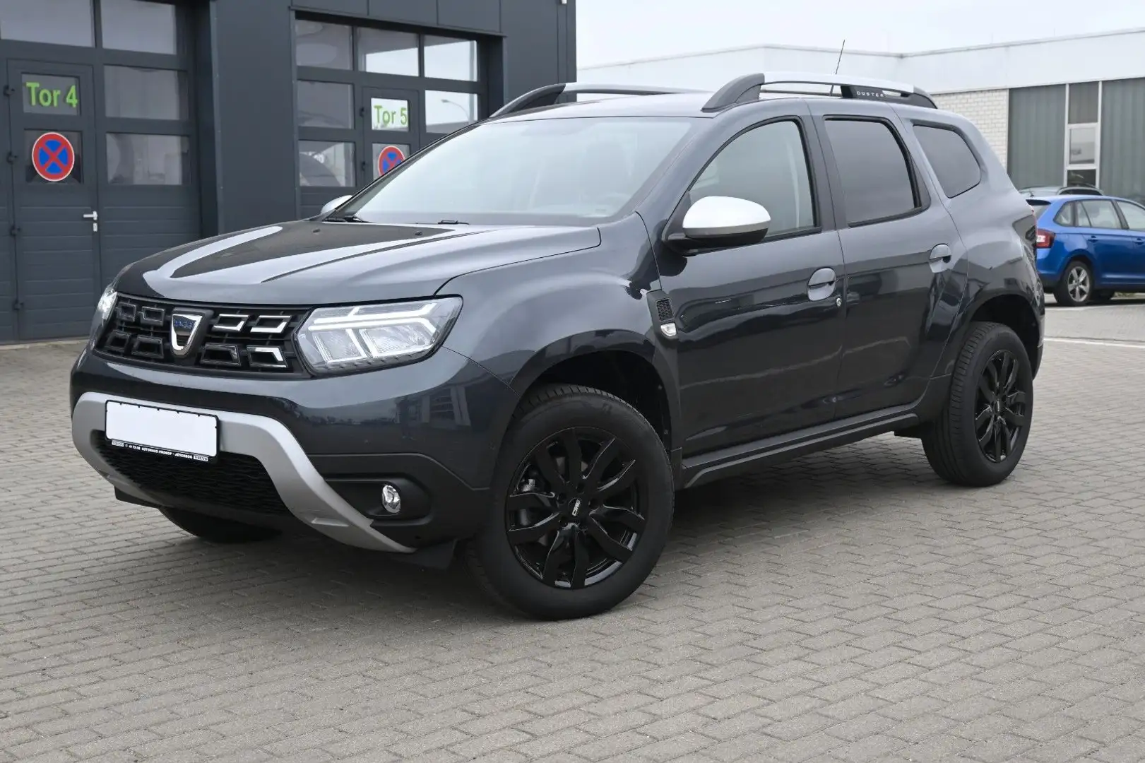 Dacia Duster II Prestige*Automatik*Tempo*AHK*RFK* Grijs - 1