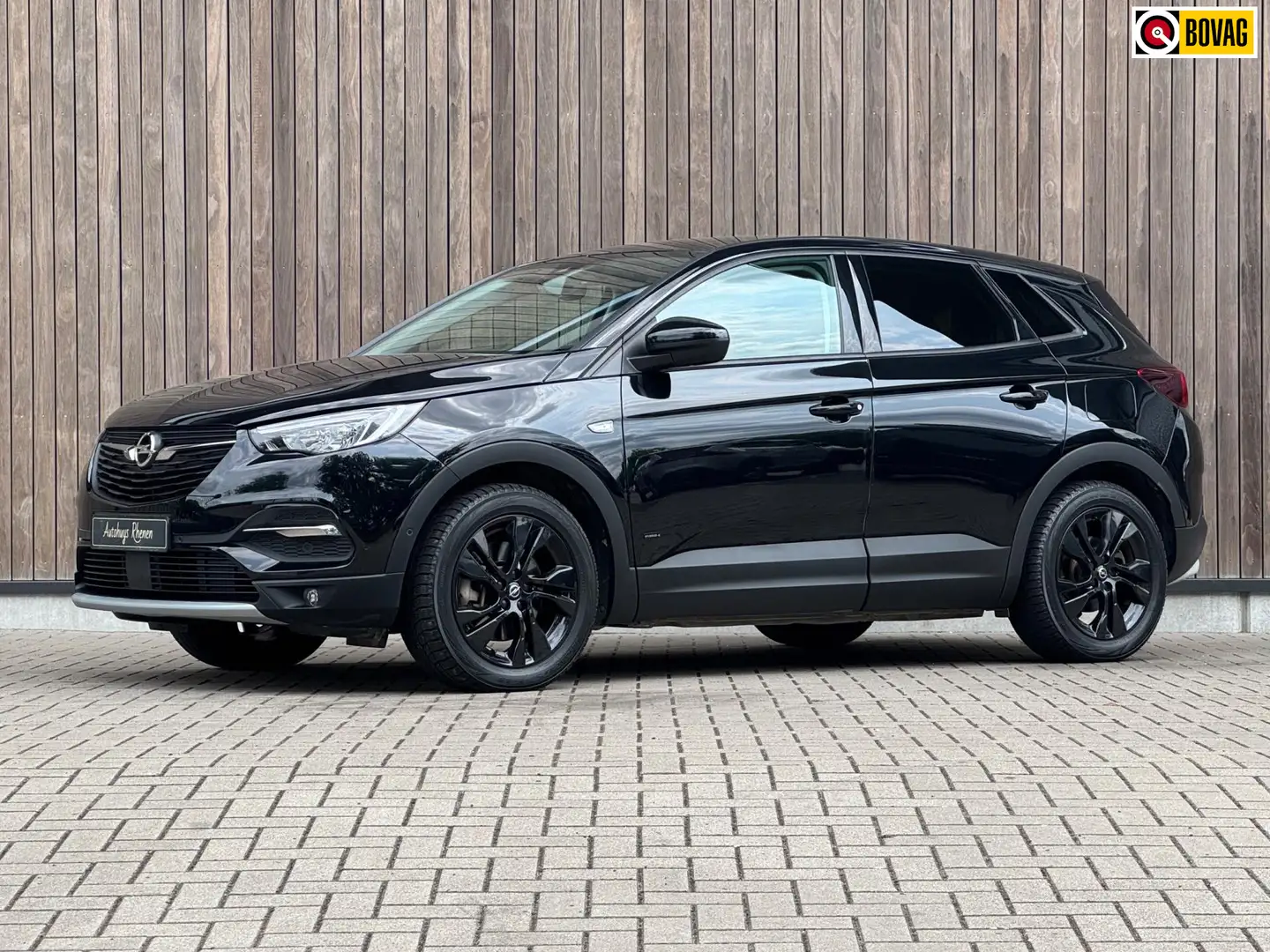 Opel Grandland 1.6 Turbo Hybrid 4x4 Business Elegance / 300PK Zwart - 1