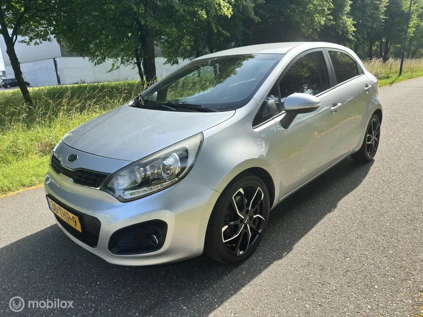 Kia Rio 1.4 CVVT Super Pack*AUTOMAAT*CRUISE*PARKEERSENSORE Gris - 1