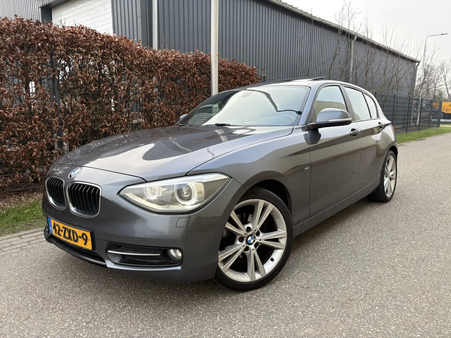 BMW 114 1-serie 114i Business+ / SPORT / LEER / SCHUIFDAK Gris - 1