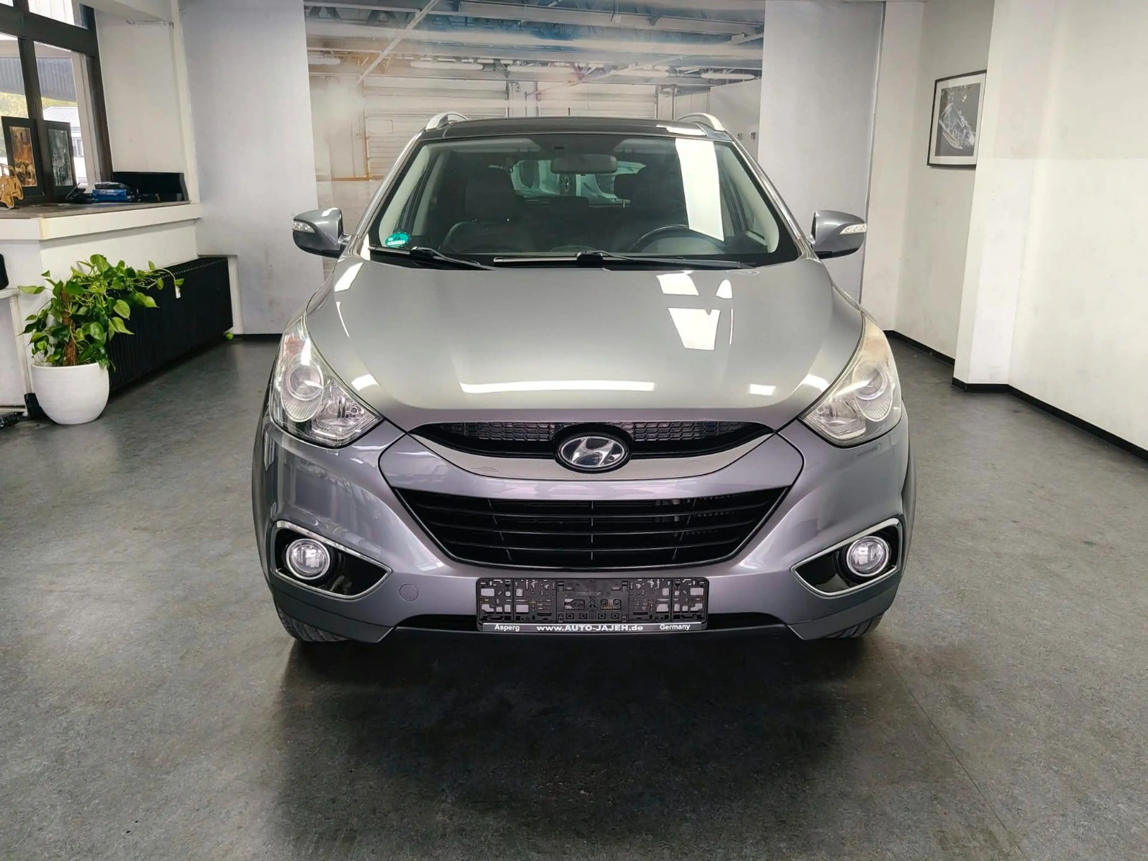 Hyundai iX35 2.0 CRDi Style 4WD AHK Panorama PDC — photo 4