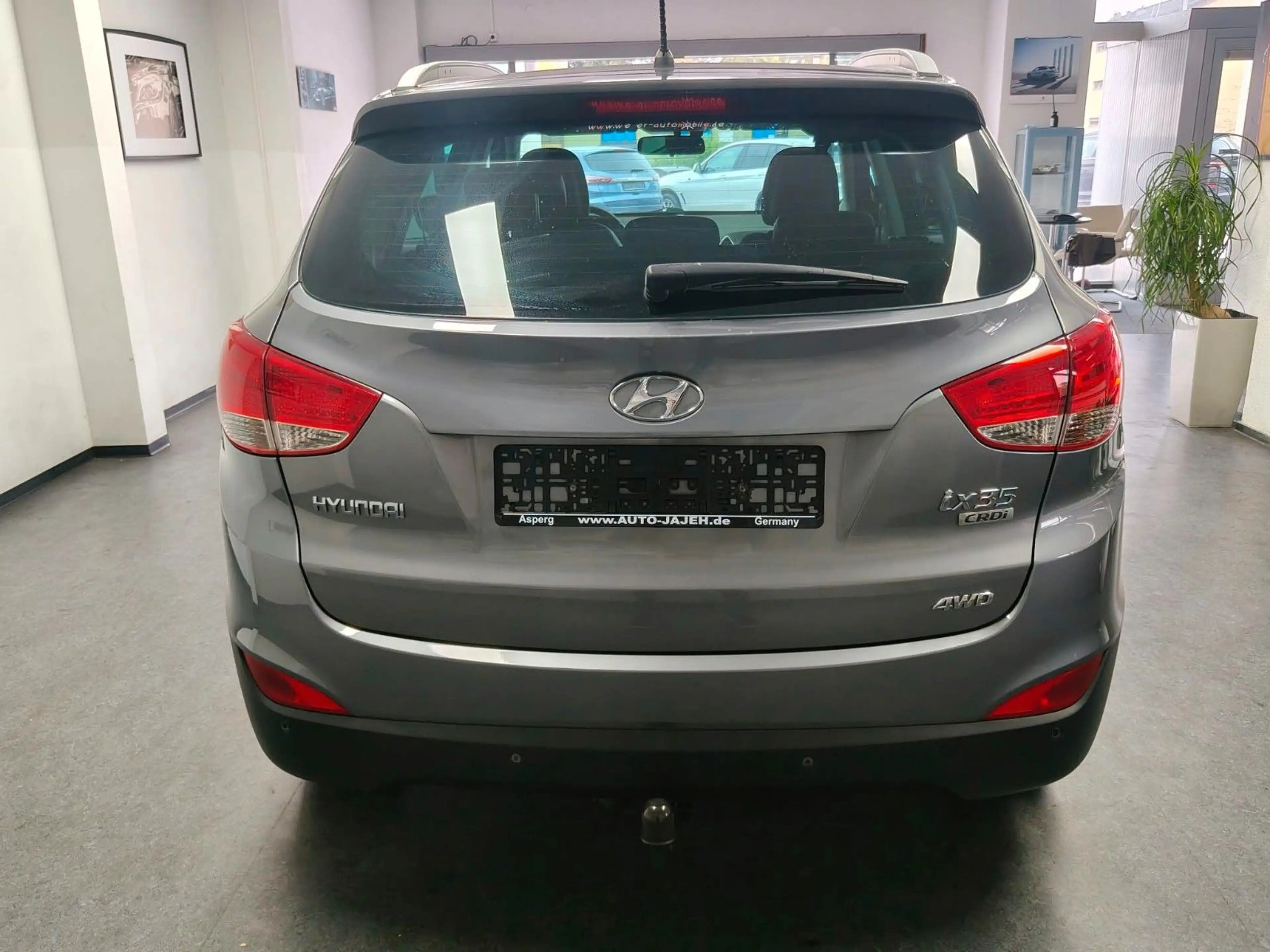 Hyundai iX35 2.0 CRDi Style 4WD AHK Panorama PDC — photo 8