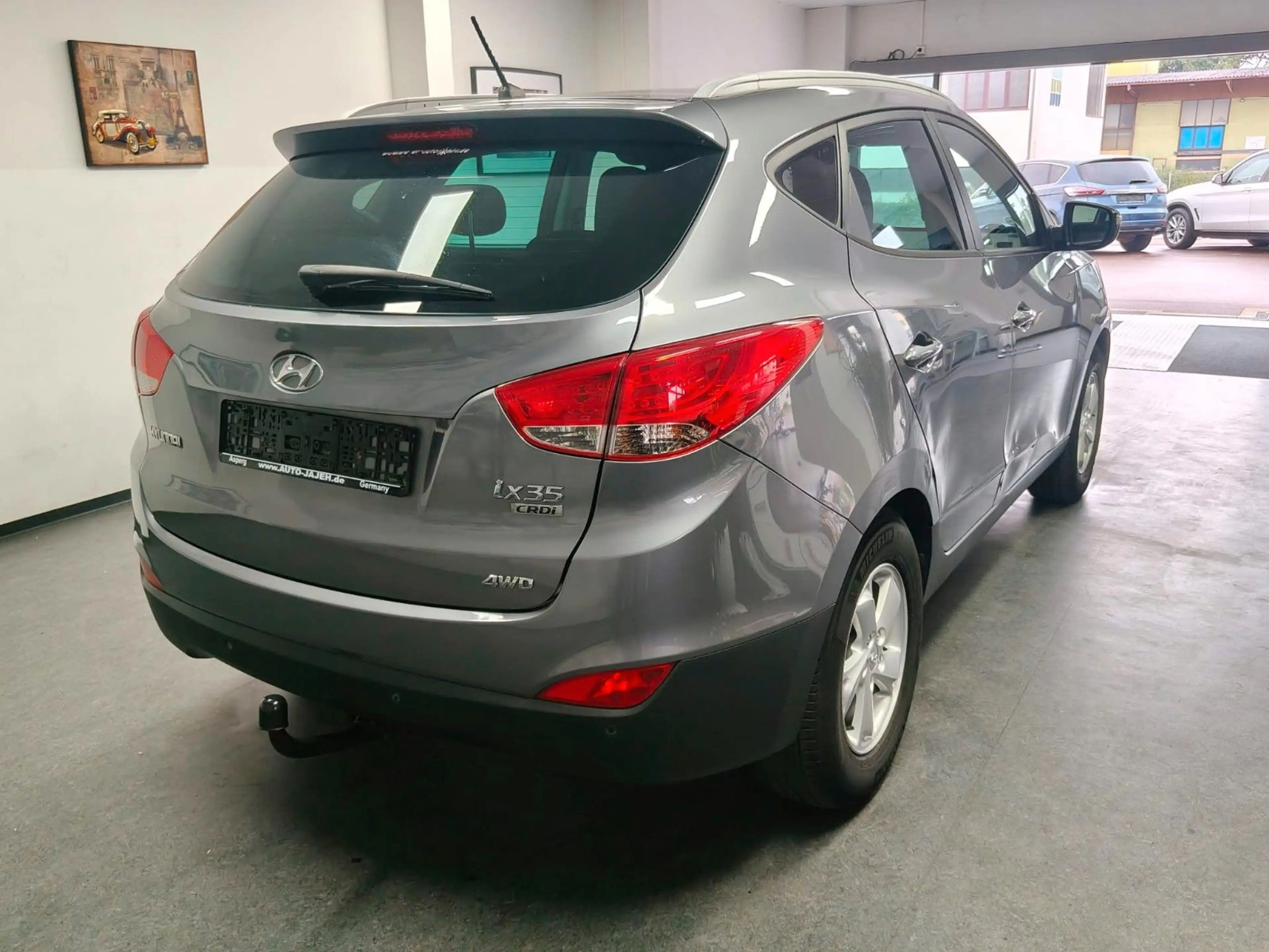 Hyundai iX35 2.0 CRDi Style 4WD AHK Panorama PDC — photo 6