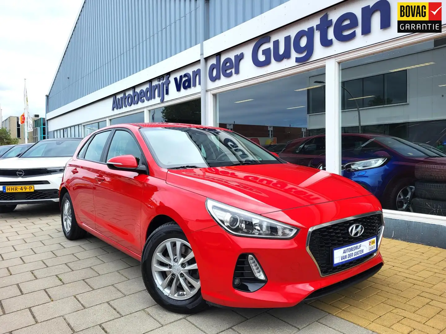 Hyundai i30 1.0 T-GDI Comfort / Airco / Bluetooth / Rood - 1