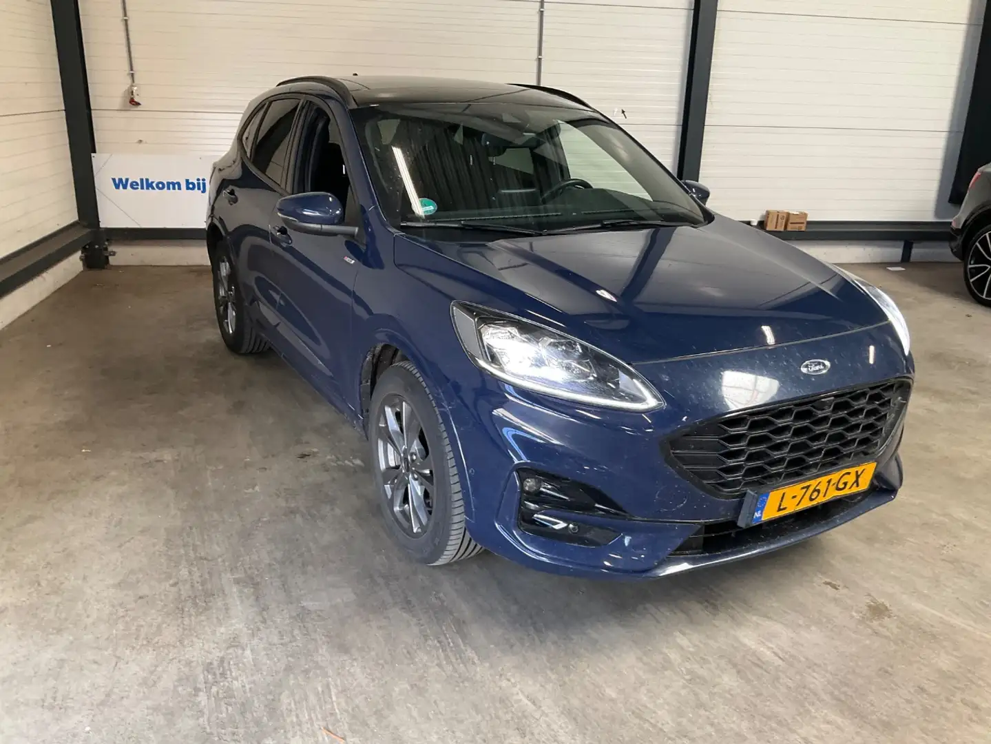 Ford Kuga 2.5 PHEV ST-Line X | Pano-dak | 100% Dealer Onderh Blauw - 2