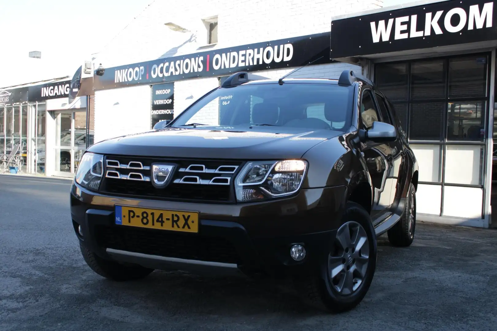 Dacia Duster 1.2 TCe 4x2 Prestige / Airco /CruiseControle / Nav Bruin - 1